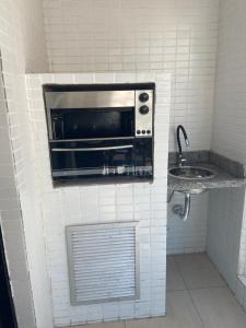 Cap2, flat com churrasqueira , 2 dormitórios, piscina, muito próximo a praia