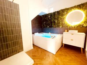 Appartements Le Jungle SPA **** : photos des chambres