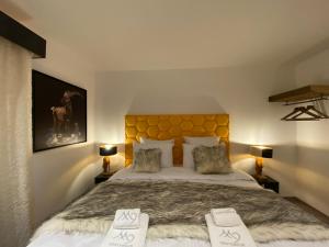Appartements Les Trois Chaufatons - Chalets Boutiques, Proprietes Mont Amour : photos des chambres