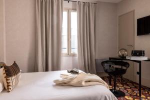 Hotels L'Hotel : photos des chambres