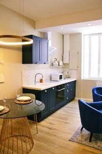 Appartements Appartement luxueux avec Jacuzzi privatif : photos des chambres