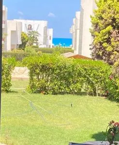 شاليه بحديقة يري البحر , بانوراما بيتش ريزورت , الساحل الشمالي The North Coast , Sea View Garden Chalet - Dawwār ‘Abd al ‘Aţī Abū ‘Ajūz