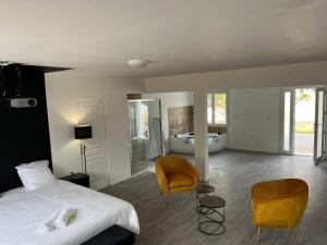 Appartements NG SuiteHome - Queven - Balneo - Netflix - Wifi : photos des chambres