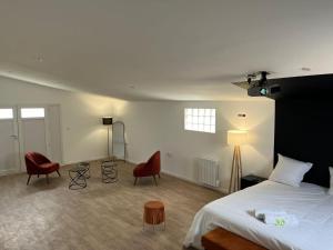 Appartements NG SuiteHome Queven Balneo I Retroprojecteur : photos des chambres