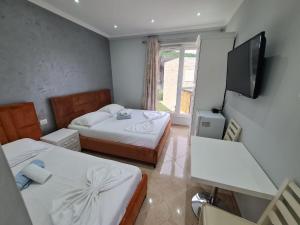 Deni Lalzi Bay Rooms