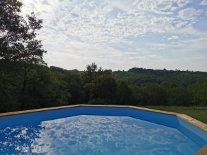 Maisons de vacances Maison typique perigourdine avec piscine : photos des chambres