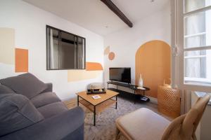 Appartements LES ARCHES - BELLE DECORATION - WIFI - AC CLiM : photos des chambres