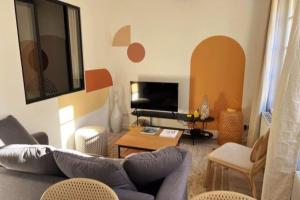 Appartements LES ARCHES - BELLE DECORATION - WIFI - AC CLiM : photos des chambres