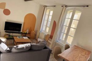 Appartements LES ARCHES - BELLE DECORATION - WIFI - AC CLiM : photos des chambres