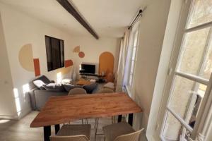 Appartements LES ARCHES - BELLE DECORATION - WIFI - AC CLiM : photos des chambres