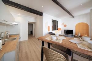 Appartements LES ARCHES - BELLE DECORATION - WIFI - AC CLiM : photos des chambres