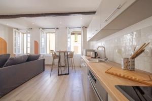 Appartements LES ARCHES - BELLE DECORATION - WIFI - AC CLiM : photos des chambres