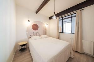 Appartements LES ARCHES - BELLE DECORATION - WIFI - AC CLiM : photos des chambres