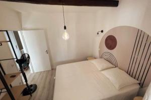Appartements LES ARCHES - BELLE DECORATION - WIFI - AC CLiM : photos des chambres