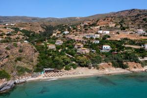 Sun-rock house by the sea by Andros Villas Collection