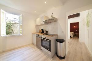 Appartements LE FIGUIER - CLIM - WIFI : photos des chambres