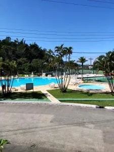Apartamento até 10 pessoas na enseada Guarujá em condomínio clube praia piscinas salão jogos quadra futebol campo parquinho brinquedos Wi-fi Home office - Sao Amaro Island