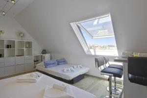 Appartements Beautiful modern studio with a view on the ocean - Biarritz - Welkeys : photos des chambres