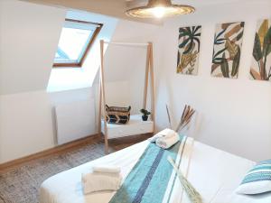 Appartements Centre - L'escapade : photos des chambres