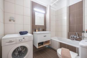 Luxury Loft with a Balcony by CloudKeys