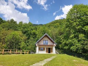 obrázek - Casa a punta Casetta nel bosco, meravigliosa vista lago