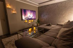 Appartements Dynasty Home Spa : photos des chambres