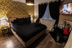 Appartements Dynasty Home Spa : photos des chambres