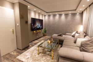 Appartements Dynasty Home Spa Appartement 100M Jacuzzi Terasse : photos des chambres