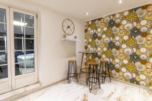 Appartements Dynasty Home Spa Appartement 100M Jacuzzi Terasse : photos des chambres