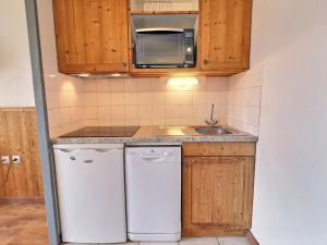 Appartements Charmant 2 Pieces avec Balcon a La Tania - Residence Skis aux Pieds - FR-1-182A-9 : photos des chambres