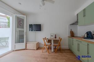 Appartements L'Evasion - Studio with a large garden - Wifi : photos des chambres