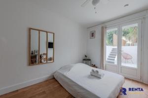 Appartements L'Evasion - Studio with a large garden - Wifi : photos des chambres