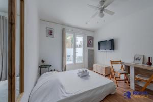 Appartements L'Evasion - Studio with a large garden - Wifi : photos des chambres