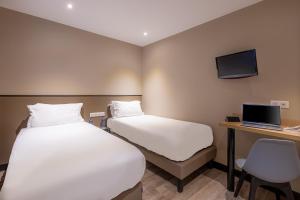 Hotels Hotel Lilas Blanc : photos des chambres