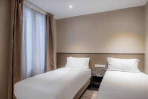 Hotels Hotel Lilas Blanc : photos des chambres