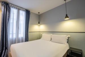 Hotels Hotel Lilas Blanc : photos des chambres