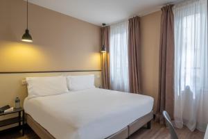 Hotels Hotel Lilas Blanc : photos des chambres