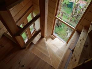 Maisons de vacances Maison atypique en bois de forme hexagonale : photos des chambres