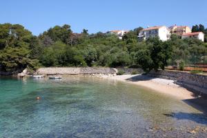 Apartments by the sea Suha Punta, Rab - 5050 