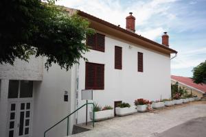 Apartments with parking space Kampor, Rab - 4984 