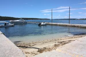 Family friendly apartments with a swimming pool Barbat, Rab - 4988 
