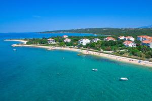 Apartments by the sea Novalja, Pag - 9326