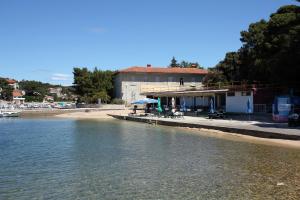 Apartments by the sea Palit, Rab - 11613 