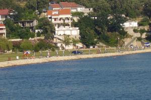 Apartments by the sea Lopar, Rab - 12534 