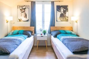 Spirit Apartments - Balkon mit Seesicht - Parkplatz