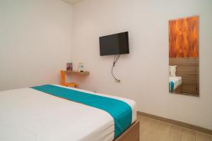 Sans Hotel Kupang Indah Surabaya by RedDoorz