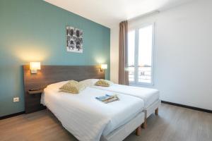 Appart'hotels Zenitude Hotel-Residences Nimes Centre : photos des chambres