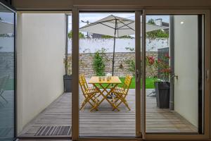 Maisons de vacances LA P'TITE VANNETAISE - Petite maison au bord de l'eau a Conleau avec velos : photos des chambres