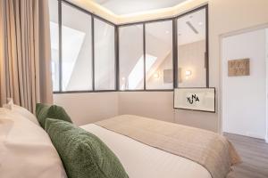 Appartements Yuna Les Halles - Serviced Apartments : photos des chambres