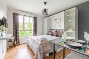 Appartements La Pink Room - Disneyland - Parking - Arrivee Autonome : photos des chambres